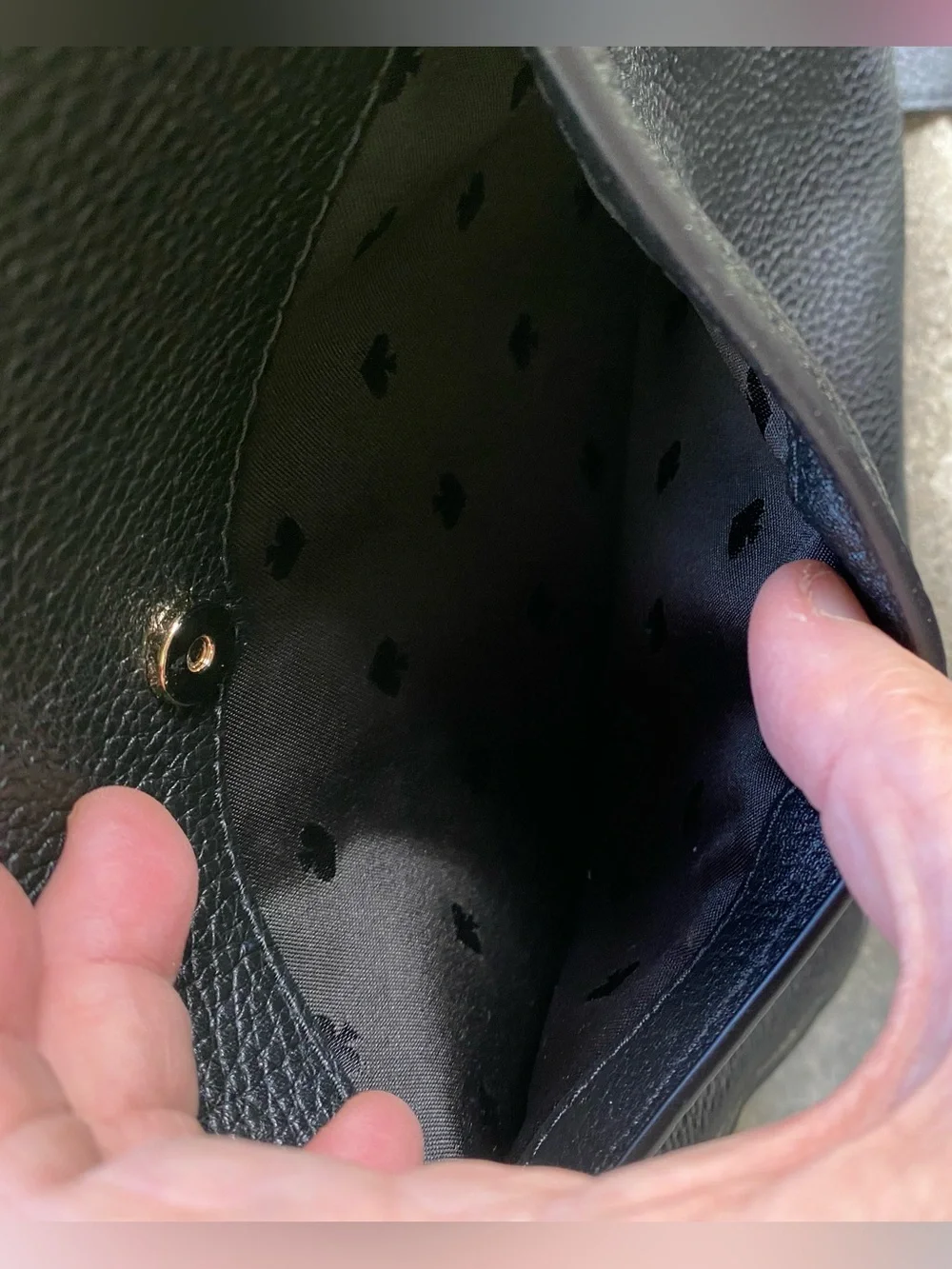 kate spade black pebbled leather crossbody with gold logo